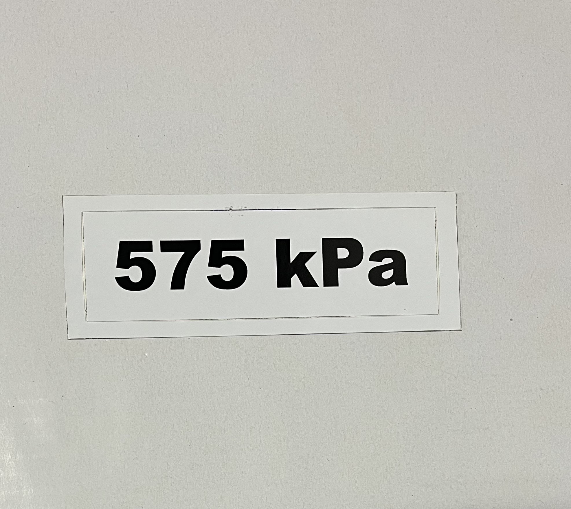 Označenie kPa 575