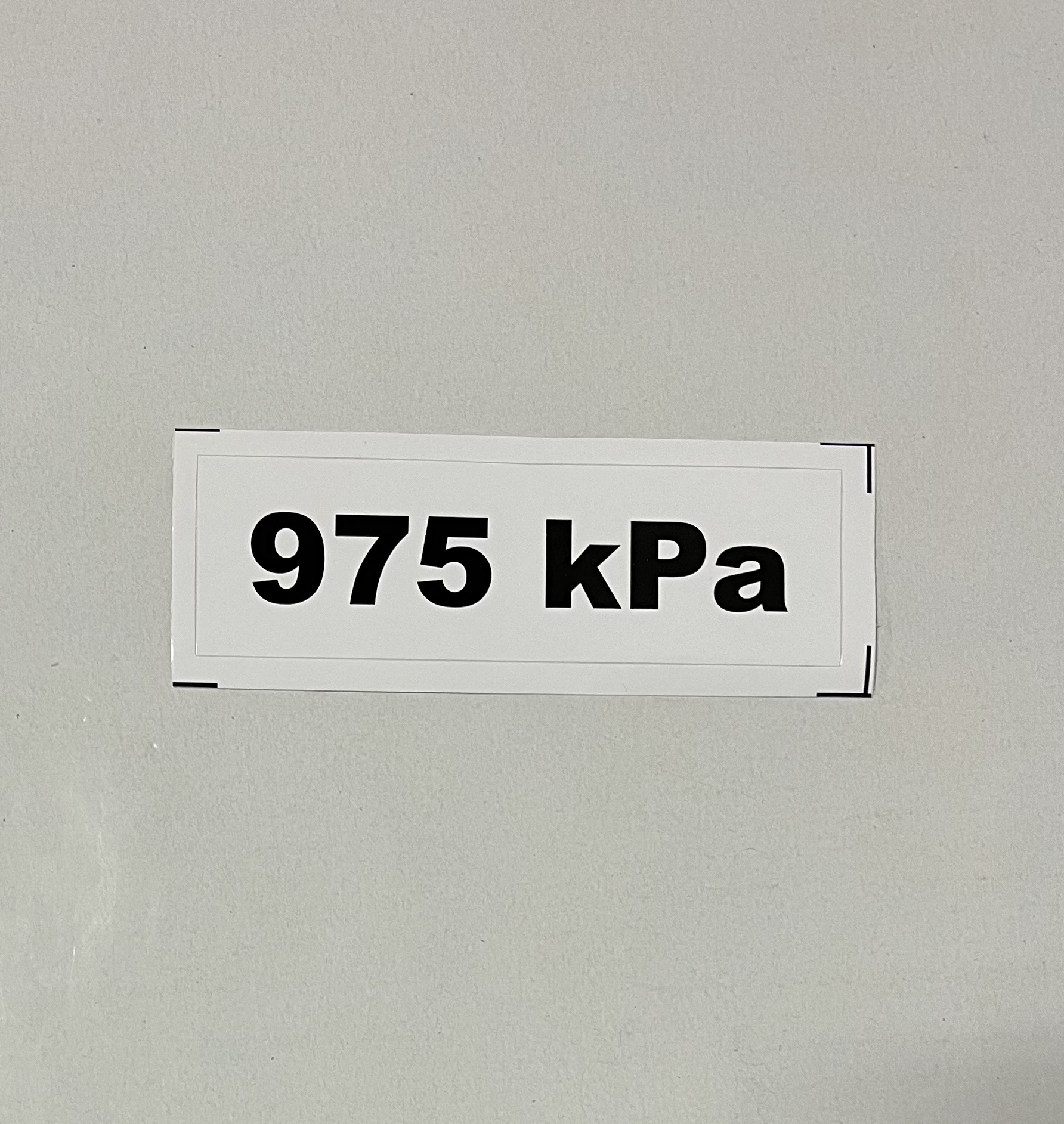 Označenie kPa 975